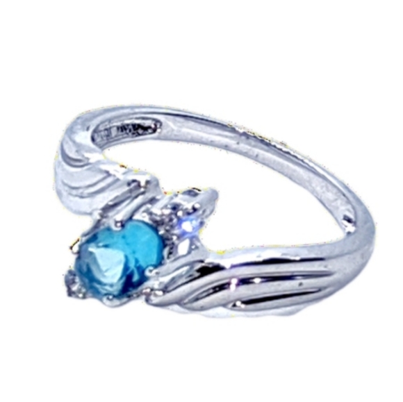 Jewelry - .Blue Topaz & Clear CZ Stones Rhodium Plated Ring